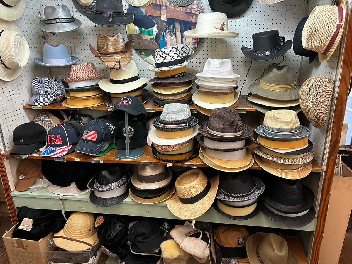 A display of caps, straw hats and headwear at Kornfeld's.