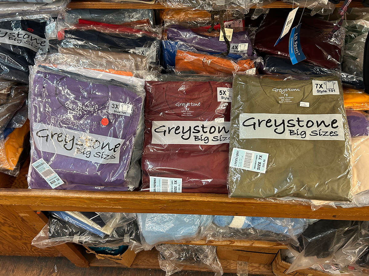 Folded Greystone Big Sizes crew-neck t-shirts in 3X, 5X and 7X at Kornfeld's.