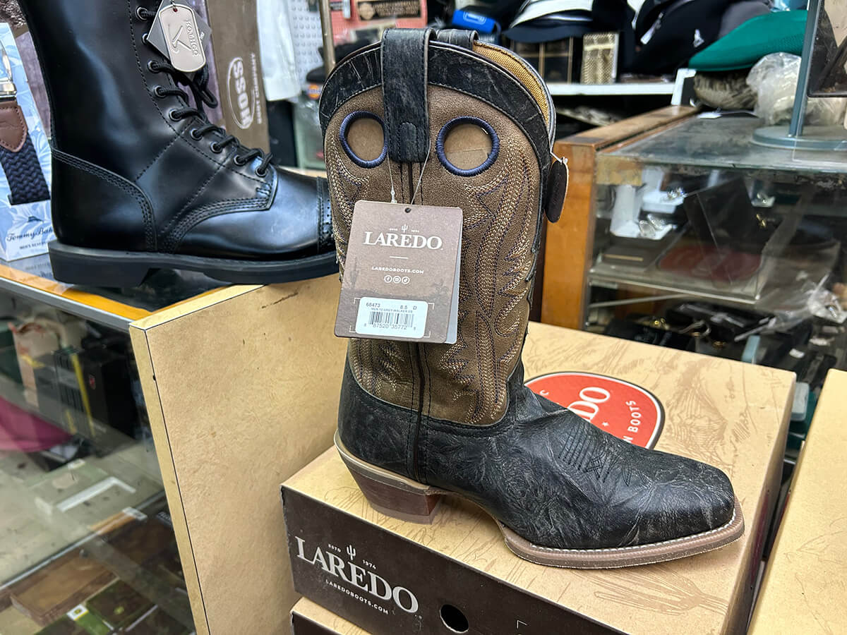 A two-tone Laredo leather work boot on its box at Kornfeld's.