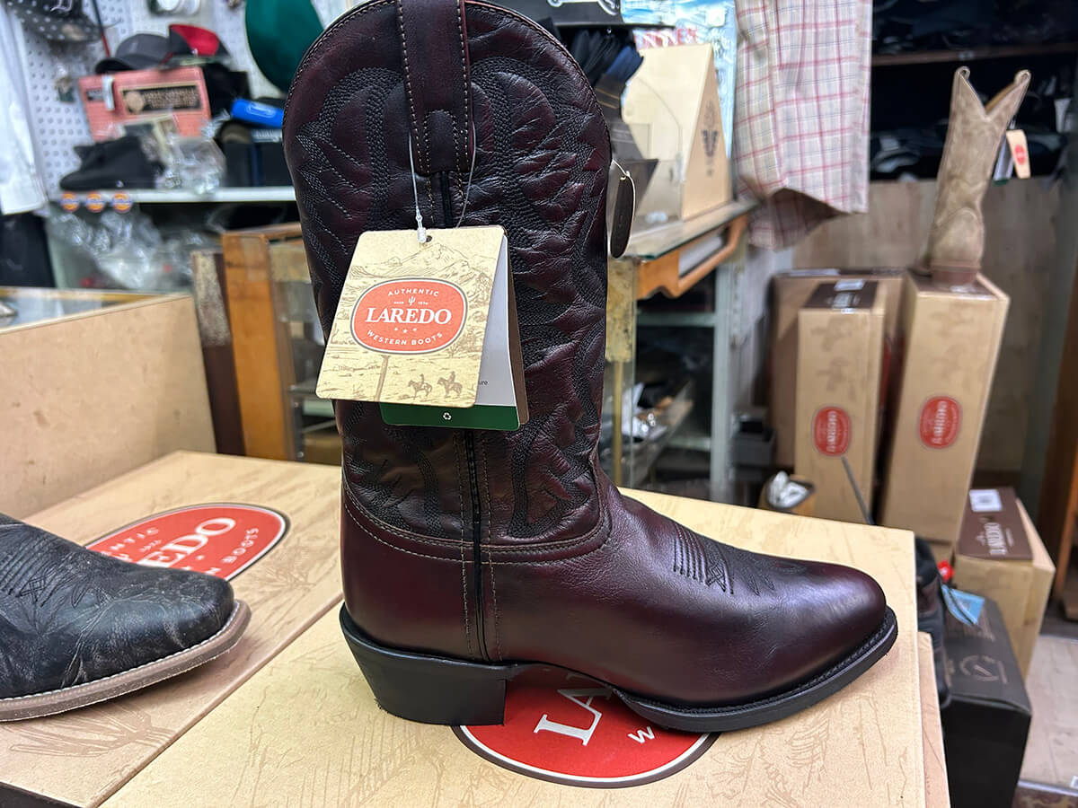 A burgundy leather Laredo western boot displayed on its box at Kornfeld's.
